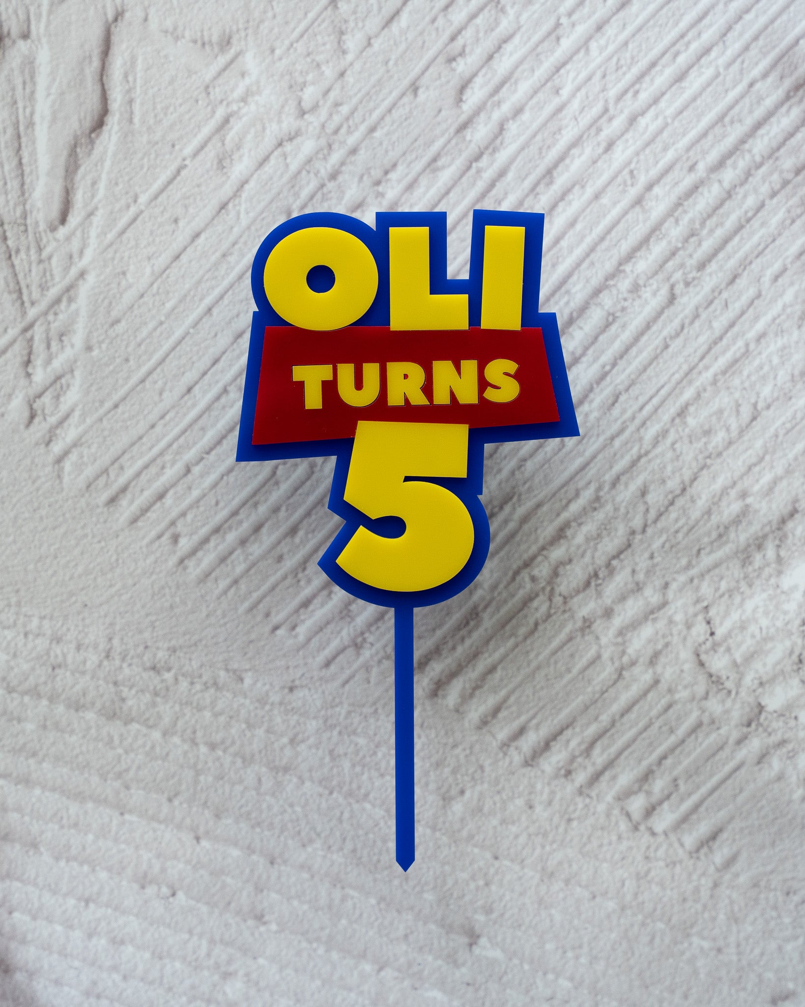 'That toy movie' cake topper